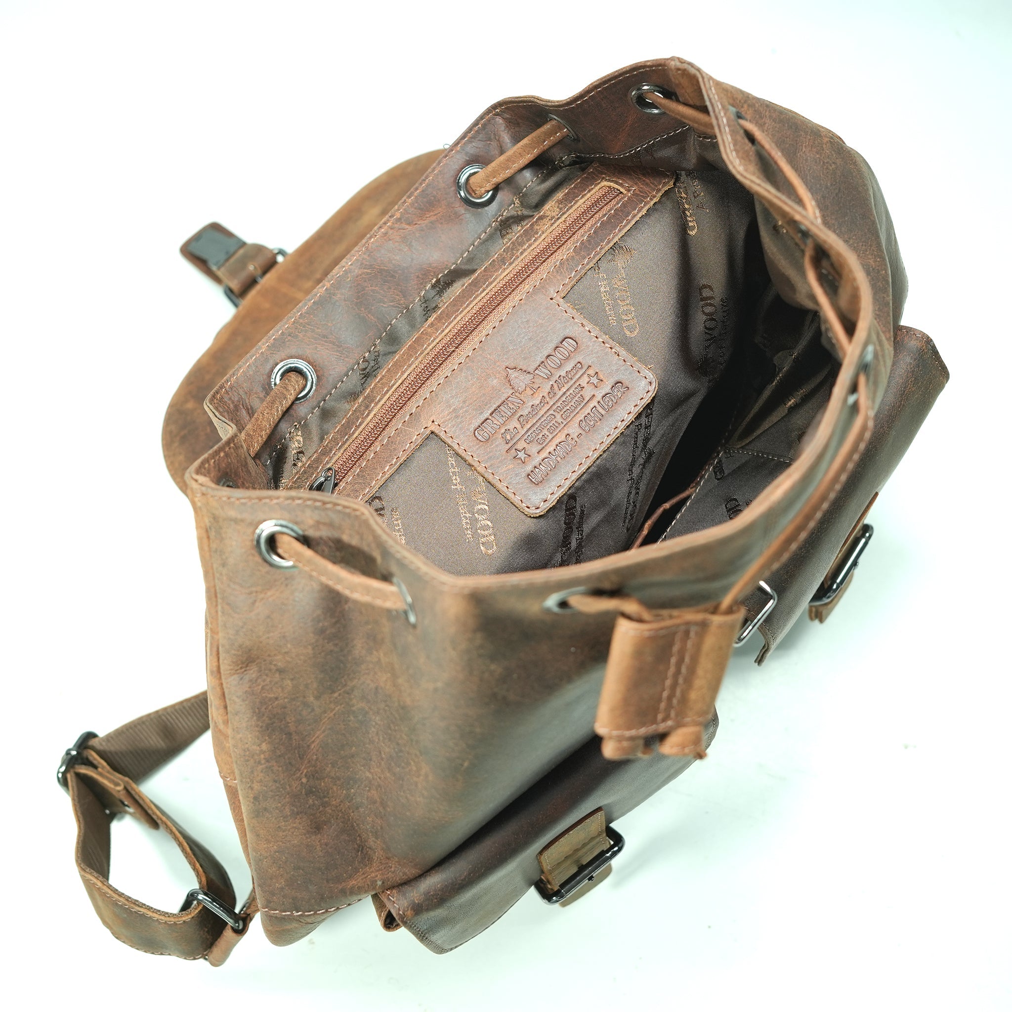 Sandal leather backpack open with Green Wood embossing