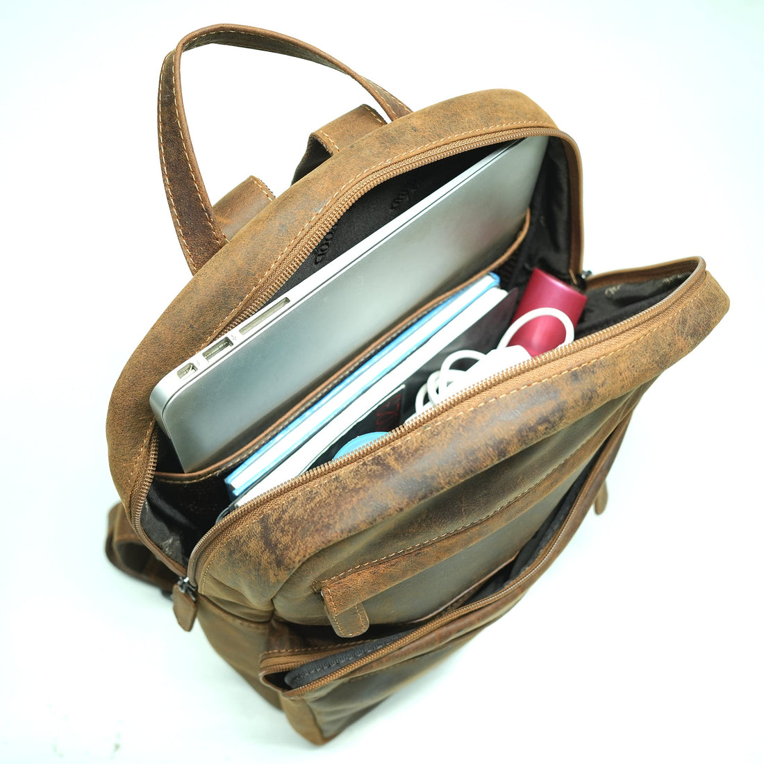 Front view of camel leather backpack with zip pockets – Greenwood unisex bag