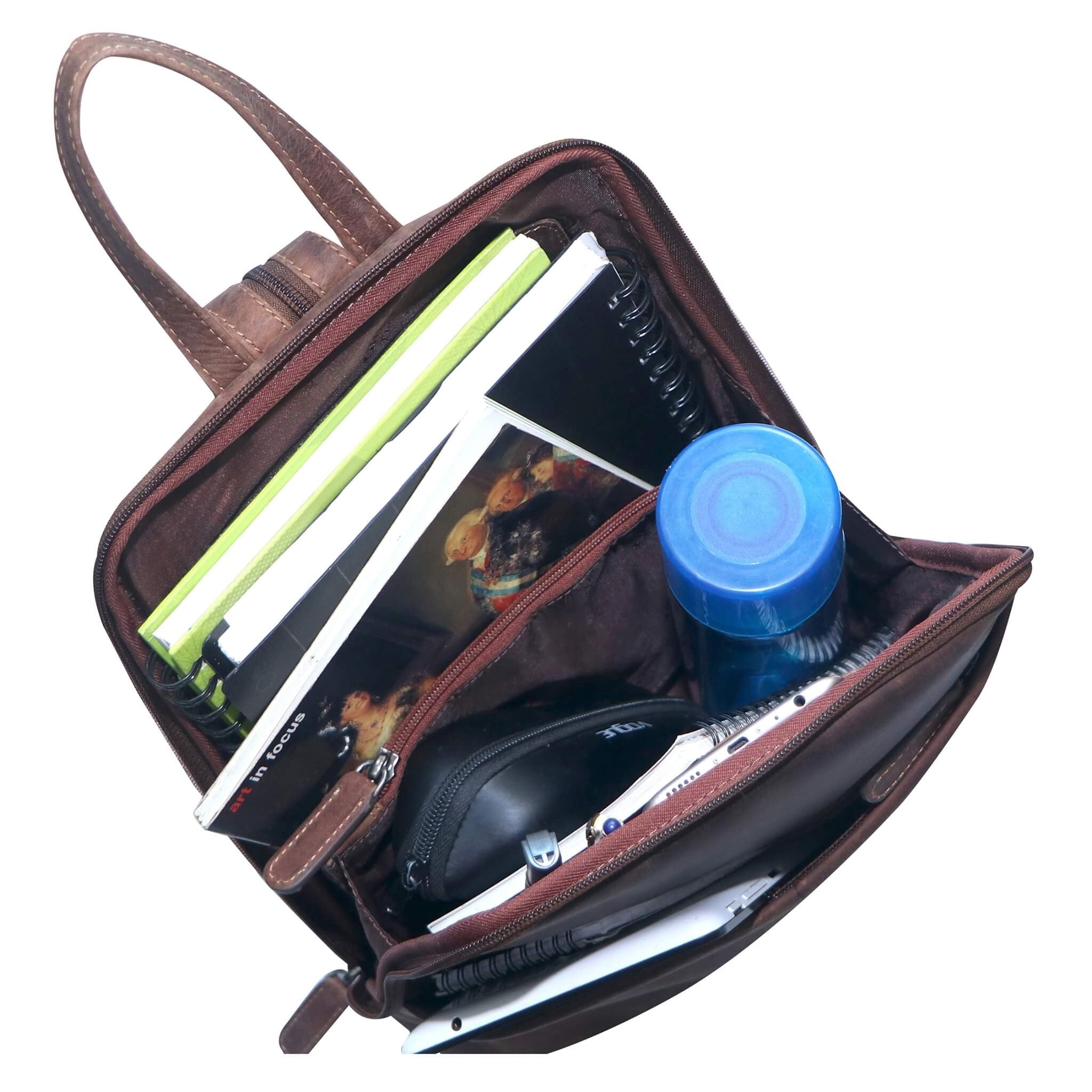 Open Khaki leather bag with items including a notebook, bottle, and electronic device.