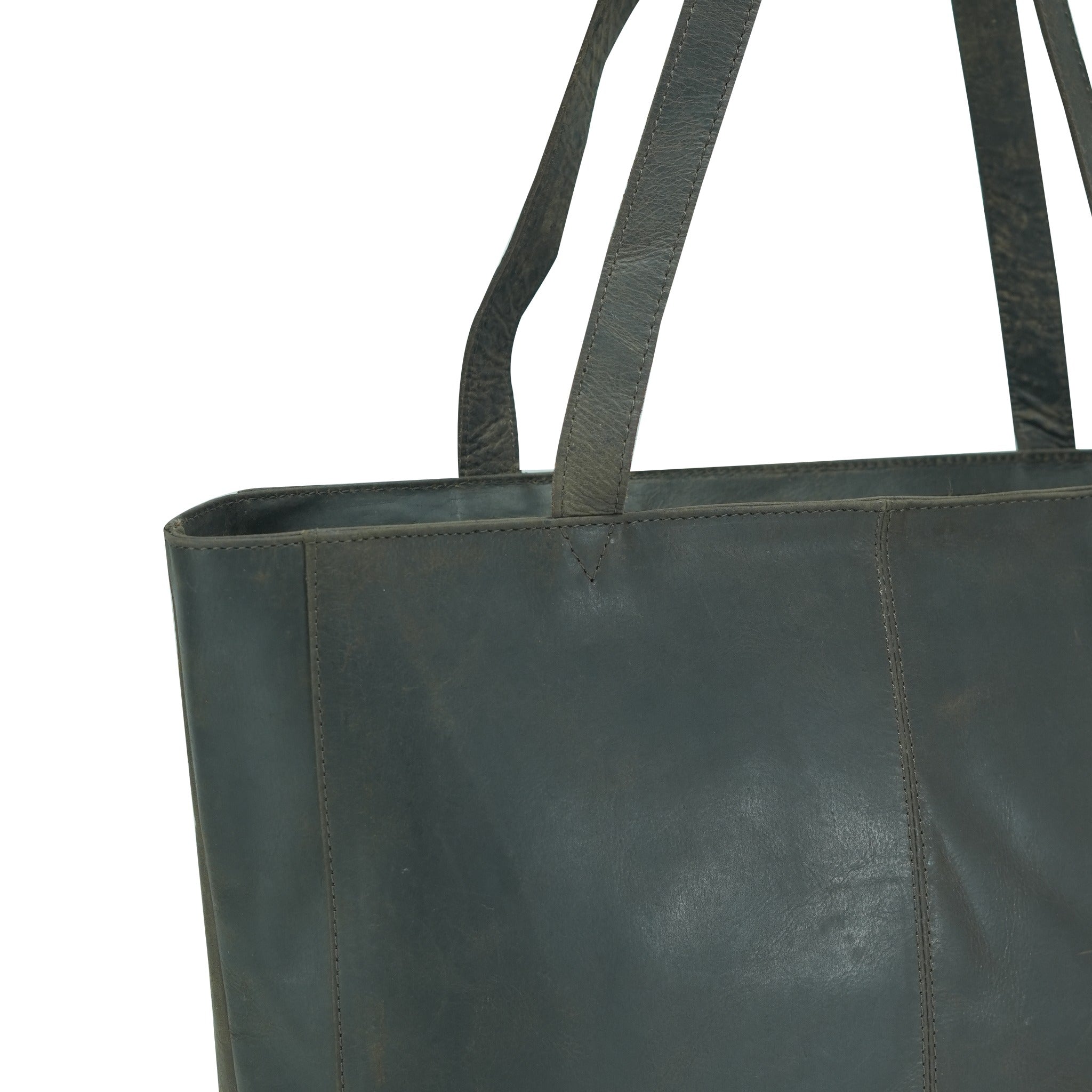 Brown leather tote bag with handles on a white background