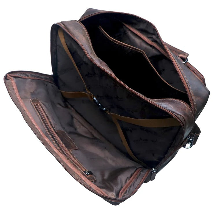 Brown leather briefcase with shoulder strap on a white background
