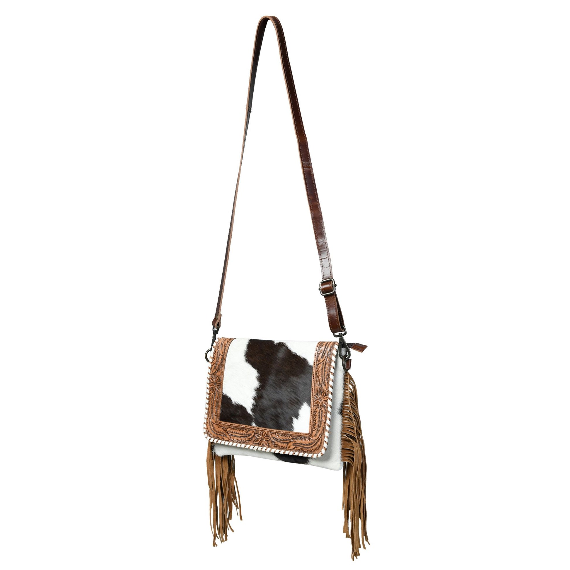 Brown tooled leather bag angle view
