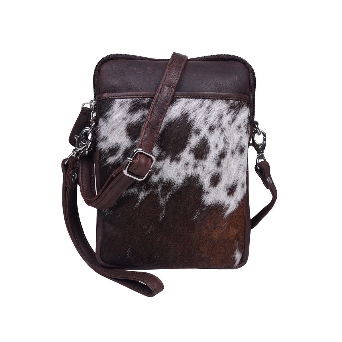 A brown and white cowhide crossbody bag with dark brown leather trim and strap, shown on a plain white background.